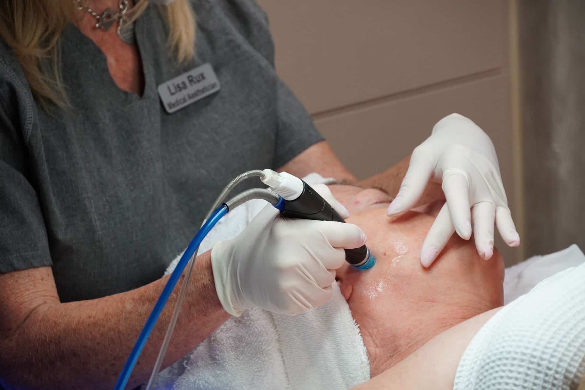 A customer receiving the microdermabrasion treatment